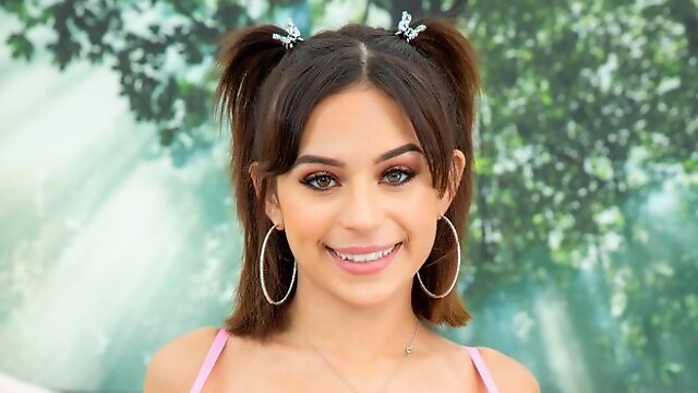 Cute-looking young brunette Aria Valencia is playing with her crack