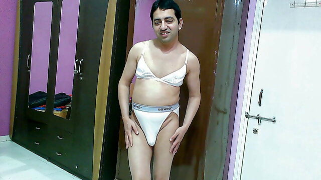 Sexy Sissy crossdresser femboy in white bra-pantie.