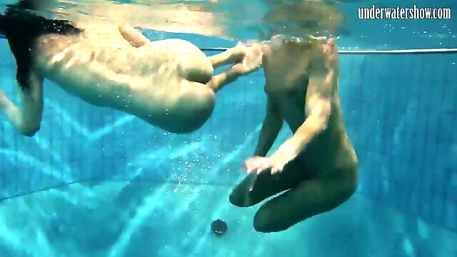 Swimming naked and horny undressing teens in the pool - Big tits