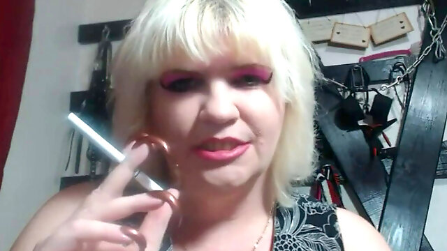 Domina PL showcasing her lengthy nails