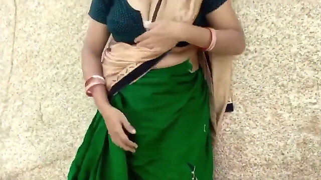 Indian Aunty in green saree bang-out outdoors