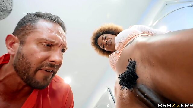 Curly-haired ebony with fake boobs shares hard knob with her bestie