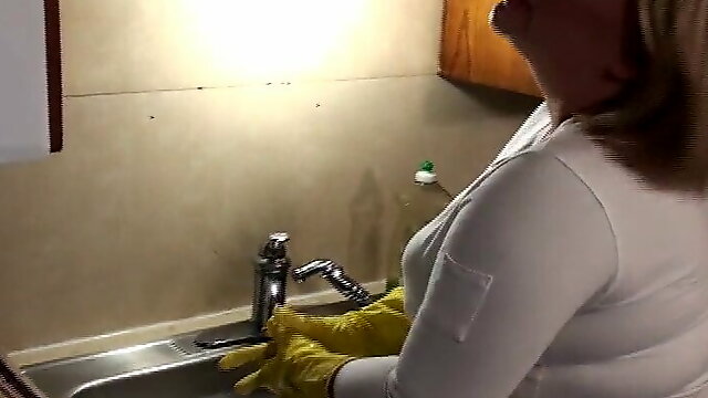 Young busty woman rubber gloves her soaking pussy