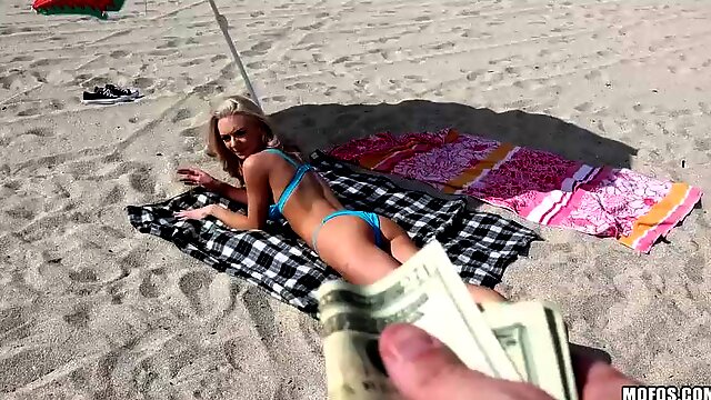 Blonde bitch Molly swallows a cock on the beach POV