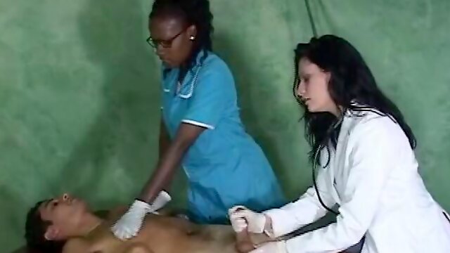 Patient receives a thorough prostate exam in an interracial threesome