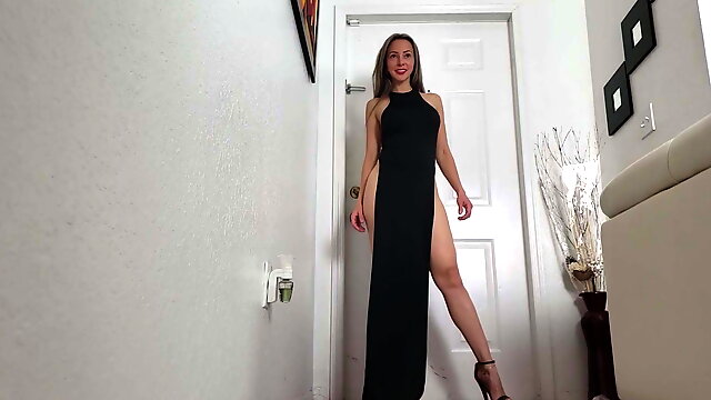 Posing in black high heels & long dress with high slit legs