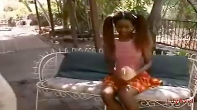 Black teen with pigtails and dirty ideas on her mind is fucking one of her neighbors