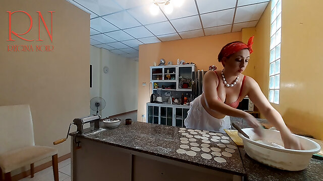 Nudist housekeeper Regina Noir cooking at the kitchen. Naked maid makes dumplings. Naked cooks. Bra 1