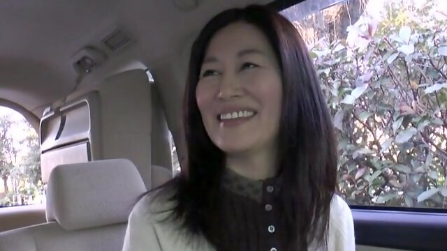 Sexy Japanese mature spreads her legs to ride a hard dick on the bed