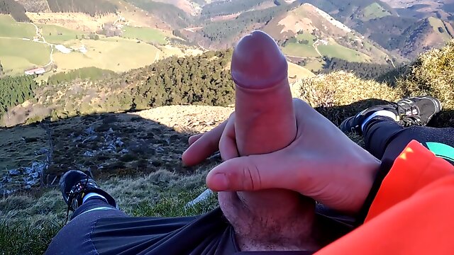 Jock In Fishnet Jerks His Big Fat Cock And Cums On Top Of The Mountain 