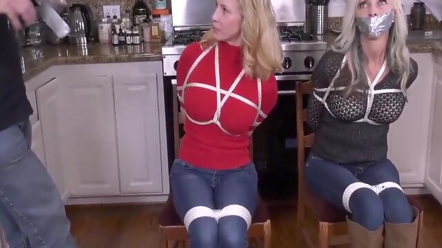 Two Milfs Duct Tape Gagged In Boots Bondage