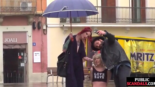 Lezdom redhead MILF shows teen slave outdoor in public