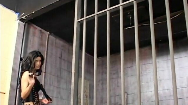Lusty S&M mistress dominates Tarzan character in jail cell