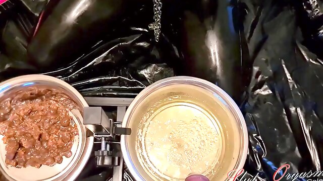 Slave In Black Latex Eating Dog Food And Drinking Piss