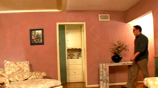 Redhead babysitter sucks her emplyer's cock then rides him in the living room