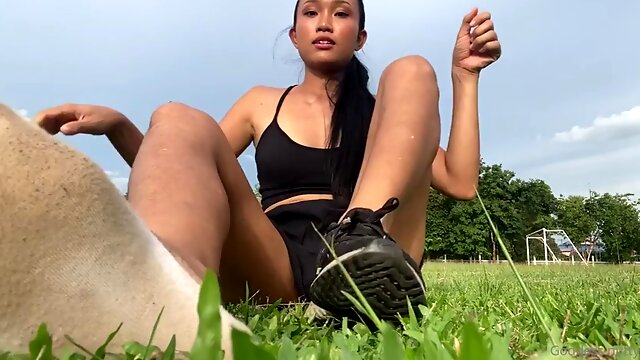 Asian girl with smelly sweaty white socks and barefoot