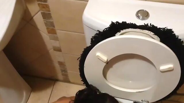 Petite girl used as a human toilet