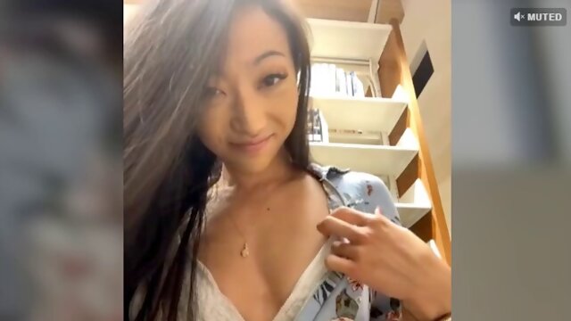 Asian slut plays outside