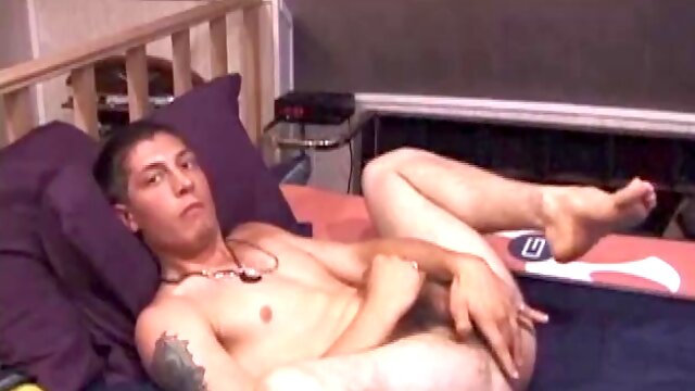 Dakota is on the bed, as he finds a place in the porn video that stimulates him. After stripping, the young man strokes his cock and fingers his ass, until he explodes all over the place. her chest with a nice load of hot cum.