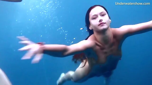 Hot erotica in the sea with 3 girls