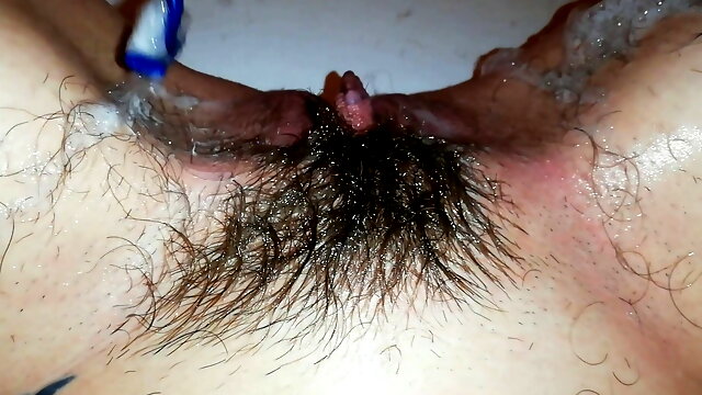 Pissing then shaving off my hairy pussy big clit closeup 