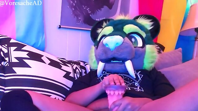 Fursuiter Lays Back And Runs Toy Through Pussy