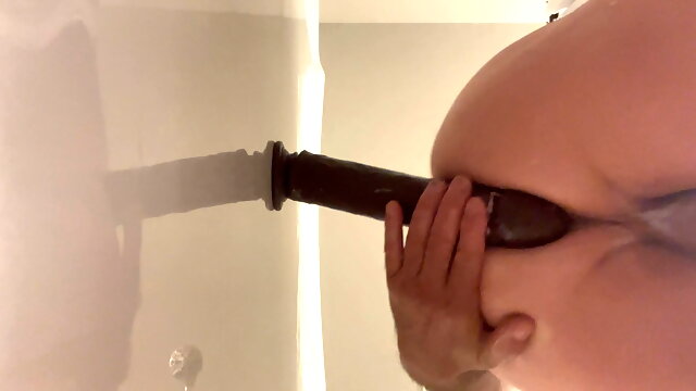 Taking 10in dildo 