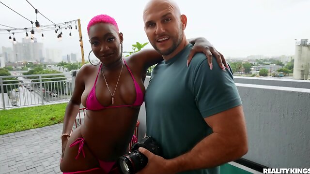 Ebony pink-haired vixen Mahogany Ross goes wild with white guy