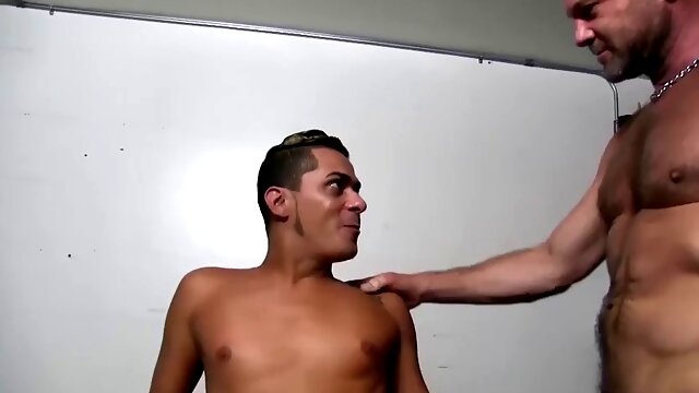 Cesar Xes is waiting for some daddy action, at the sex club, when Chad Brock spots him on the fuck bench. Chad wastes no time shoving his big daddy cock in the boys mouth giving him a real fucking face.