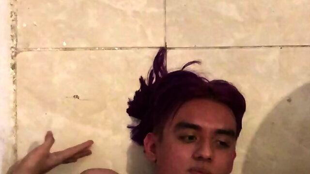 Purple hair gay latino self facial