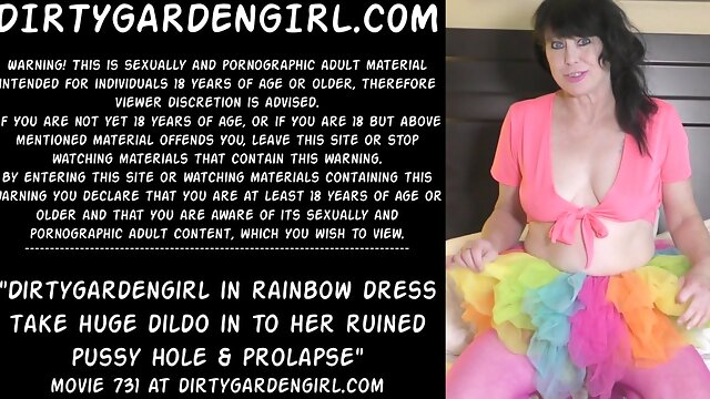 Dirtygardengirl in rainbow dress take huge dildo in to her ruined pussy hole & prolapse