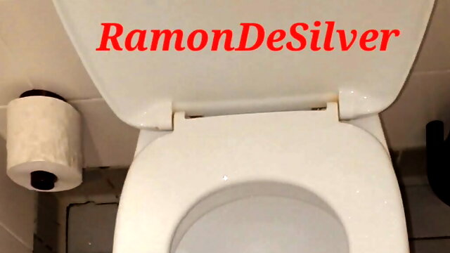 Master Ramon pisses on the toilet dominantly, dirty horny, golden champagne for the slaves