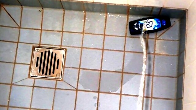 Master Ramon pisses horny in the shower.  very hot