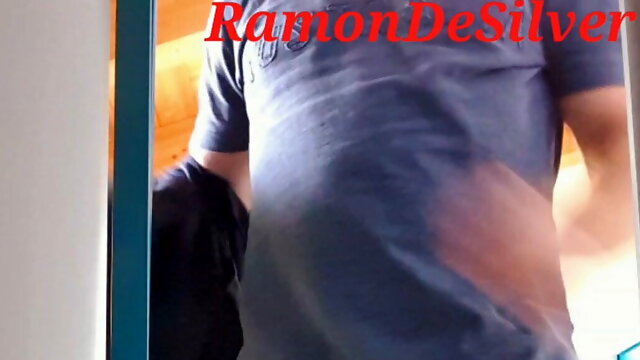 Master Ramon undresses in the dressing room and pisses in the pool shower looking horny in sexy satin shorts