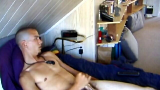 Chance looks directly at the camera as he slowly pulls his pants down. He asks if we like it when his long cock sticks out, ready to get some attention.