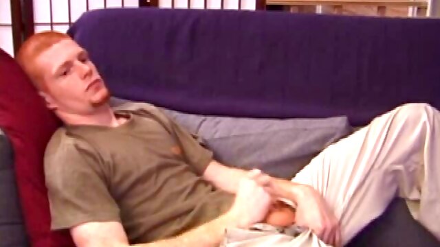 Tristian grabs his balls and strokes his long cock resolutely. He kneels in front of us and sticks his cock right in the camera. Getting up, Tristian continues to jerk off until he asks us if we want it on our face.