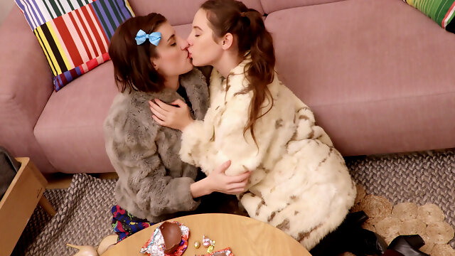 Young lesbians Willow A and Lucy Q make love on the couch