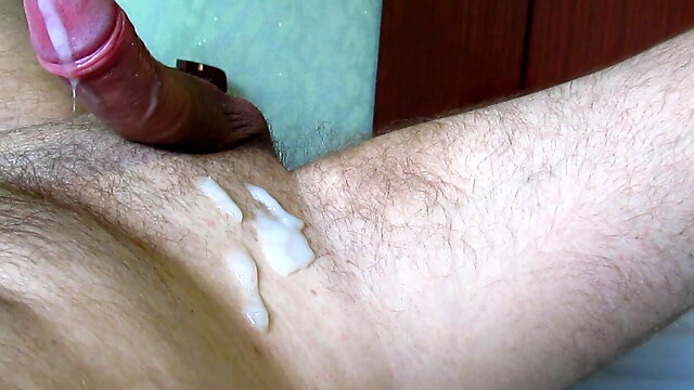 Big cumshot from cock handjob with vibrator