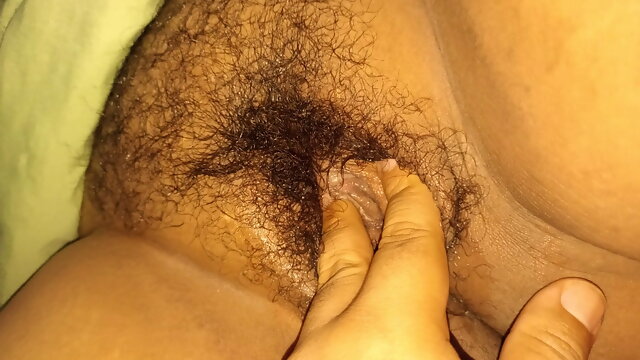 My wife's hairy pussy and clitoris