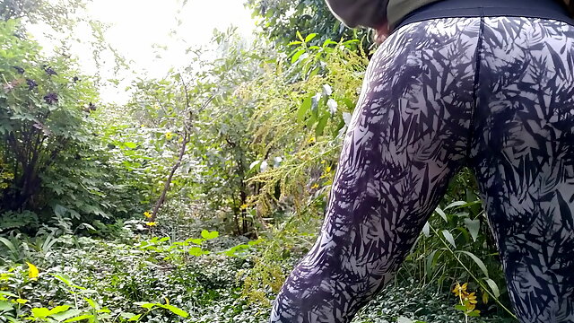 Huge ass fat MILF in leggings pissing doggystyle outdoors