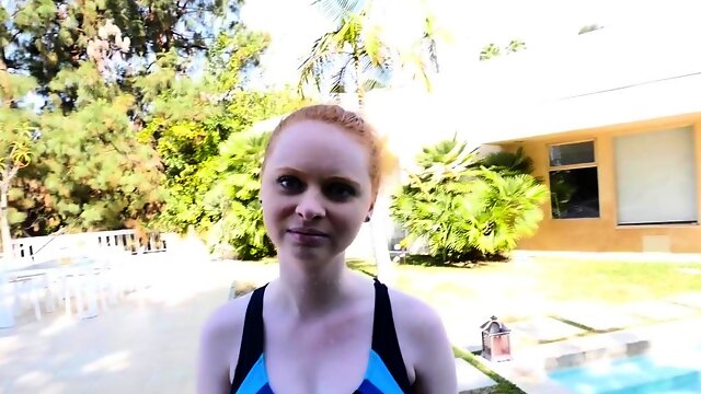 Teen redhead in swimsuit