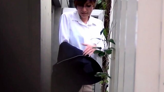 Asian lady pees at work