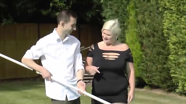 Pool boy gets lucky with busty granny in bedroom