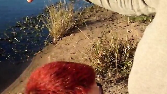 Short haired redhead with tiny boobs sucks a big dick in th