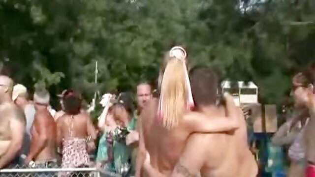 Scandalous public nude party with many girls