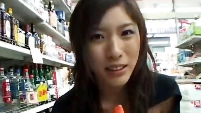 Kinky wet fingering action in a public Japanese store
