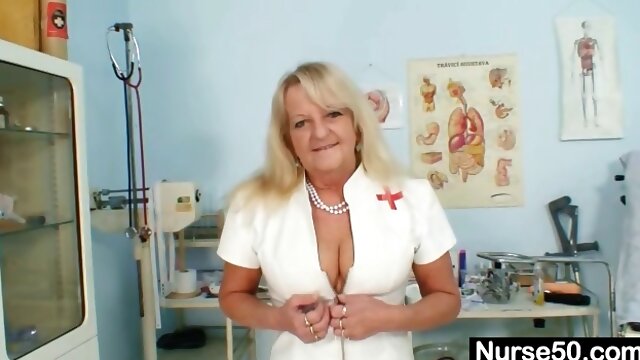 Grandma in uniform spreads blond hairy pussy