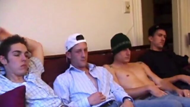 While these four are horny watching porn, their pants fall down and soon everyone is sitting on the couch with a cock in their hand.