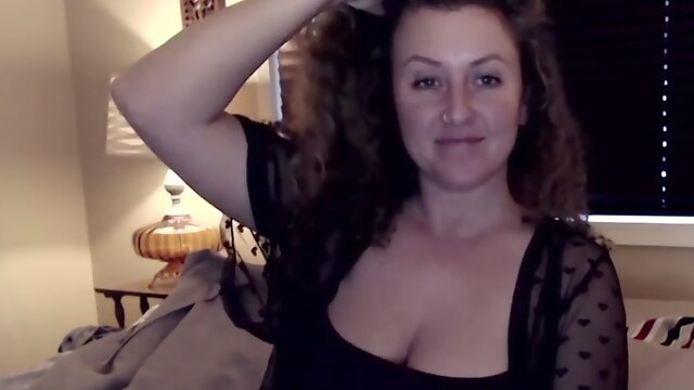 Brunette with big boobs masturbates on webcam