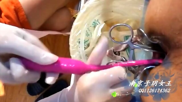 Beautiful Female Surgeon With Surgical Gloves Fisting